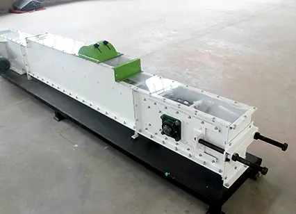 Cinta transportadora rascadora