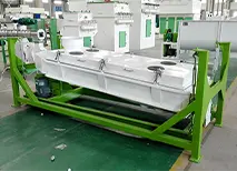 Puerto de descarga del enfriador de pellets