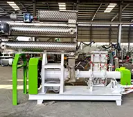 Extrusora de alimento para peces con doble acondicionador